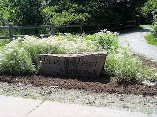 Large stone sign in front of a park in Richvale, Richmond Hill, Ontario