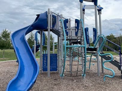 Blue playground structure with blue slide in Yongehurst, Richmond Hill, Ontario