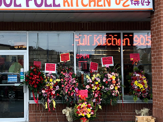 Exterior of eatery with giant bouquet of flowers in Headford, Richmond Hill, Ontario